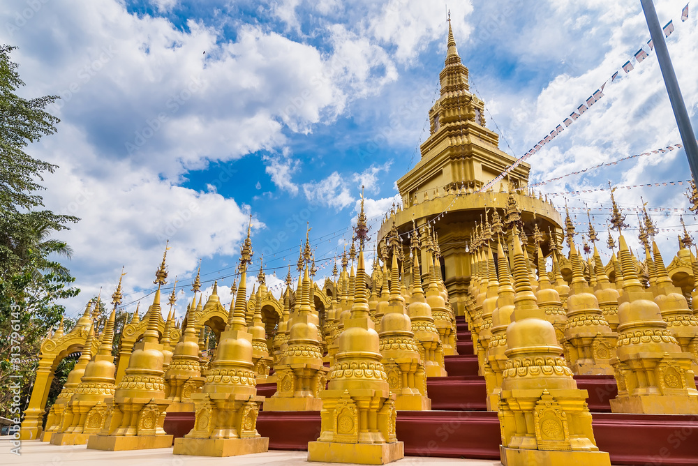 Naklejka premium Saraburi , Thailand - January, 2, 2020 : Golden pagoda at Wat pa sawang boon temple , Saraburi , Thailand