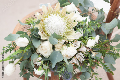 A bride's white and green bouquet 