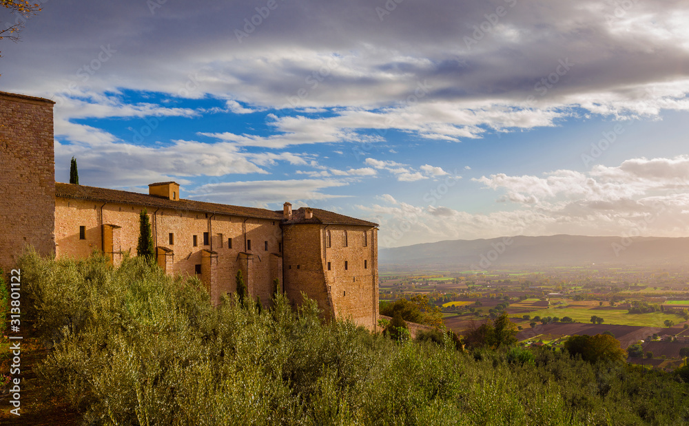 View of Umbria valley just before sunset from Assisi charming historic center