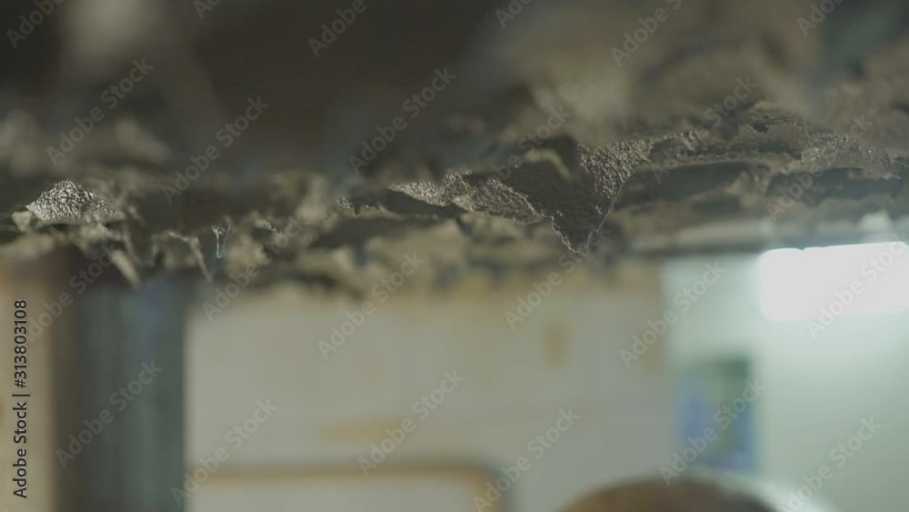 Construction worker is plastering wall and beam using cement plaster HD Construction worker is plastering wall and beam using cement plaster HD