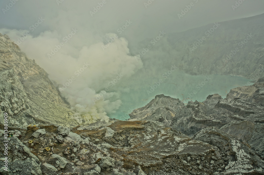 Ijen Crater is a acidic crater lake located at the top of Mount Ijen ...