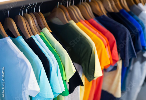 Assortment of summer clothing in modern store