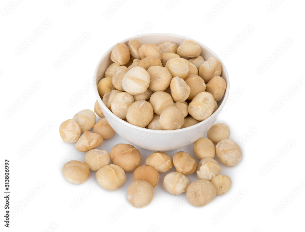 shelled macadamia fruit in the white bowl isolated on white background shelled macadamia fruit in the white bowl isolated on white background