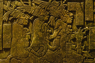Ancient Mayan drawings on the stone wall