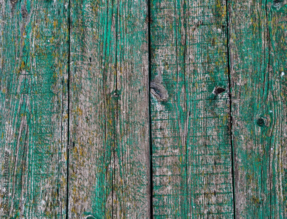Obraz premium Old pier. Shabby green wooden background. Rustic style. Favorite wallpaper. The texture of wood boards.