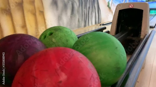 bowling ball rolls out for other players