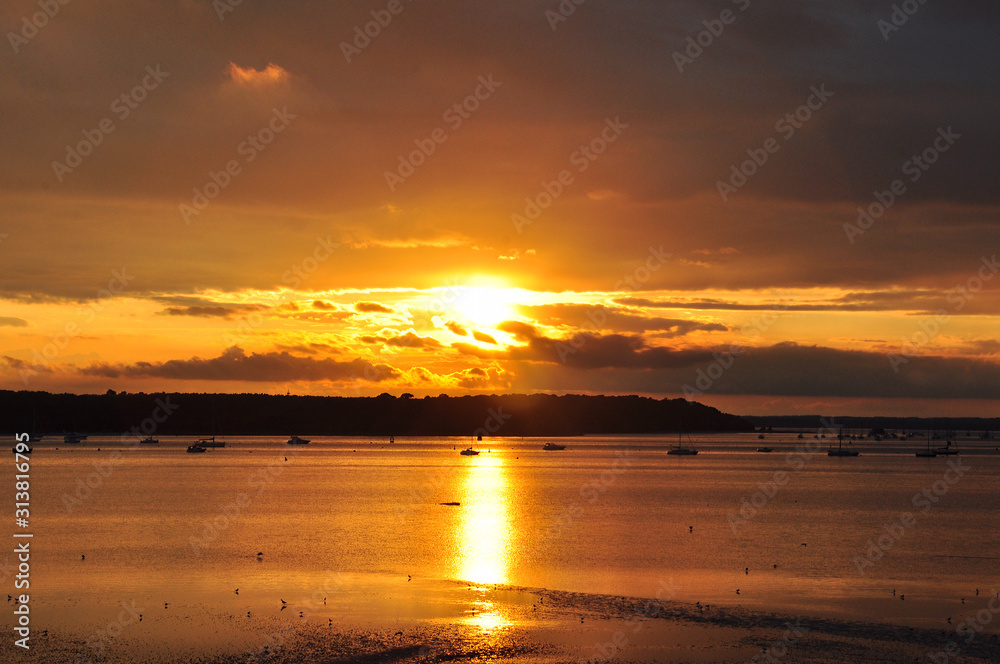 Poole harbour sunset in the summertime Poole harbour sunset in the summertime