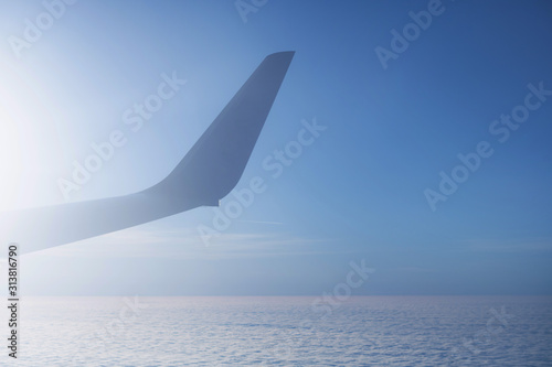 View from a flight to a aircraft with sky as a background.