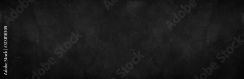 Obraz  z motywem Blank wide screen Real chalkboard background texture in college concept for back to school panoramic wallpaper for black friday white chalk text draw graphic. Empty surreal room wall blackboard pale.