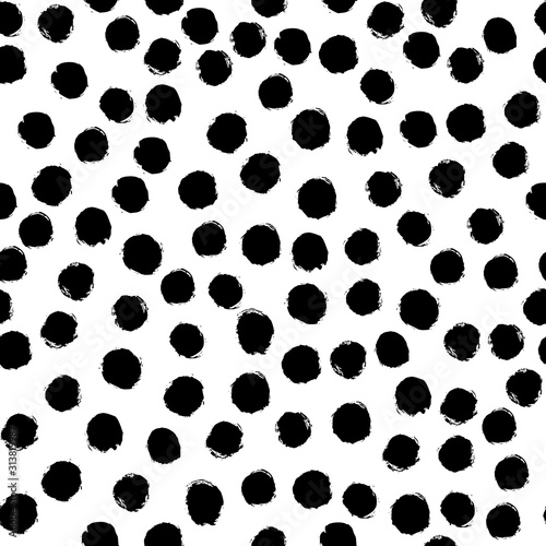 Seamless polka dot pattern hand drawn with a brush. Vector Monochrome Grunge texture of circles. Scandinavian background in a simple style for printing on textiles, paper, Wallpaper, print on t-shirts