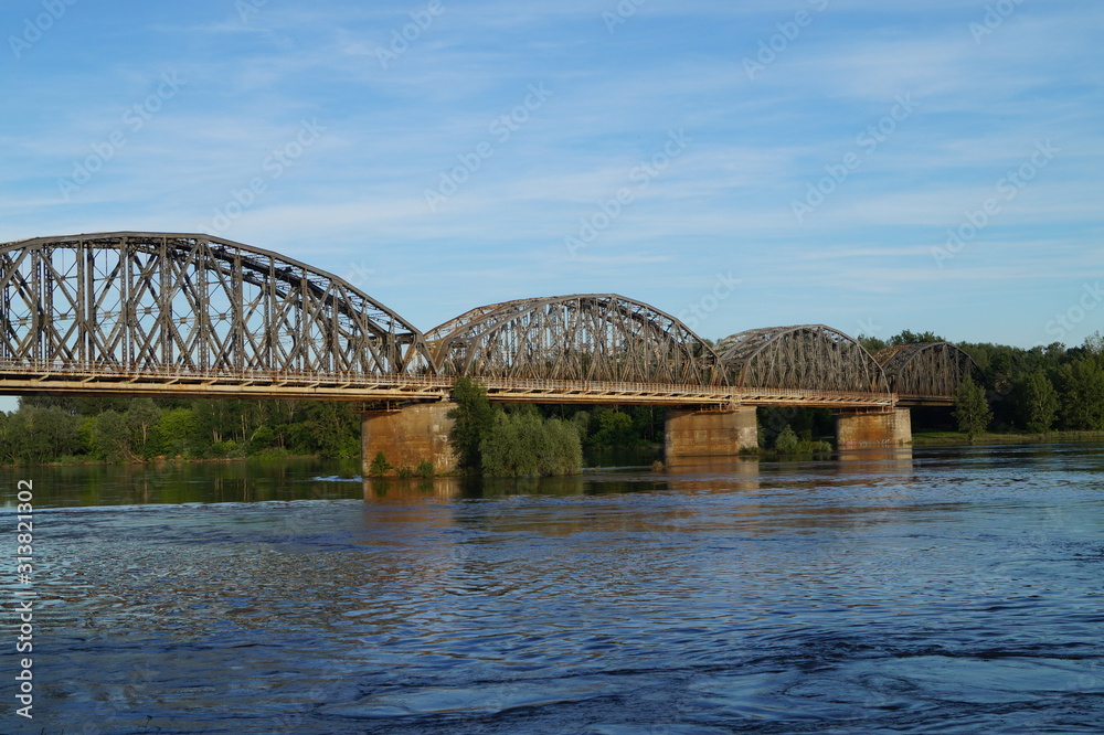 a huge bridge over the river in which drive trains across the city a huge bridge over the river in which drive trains across the city