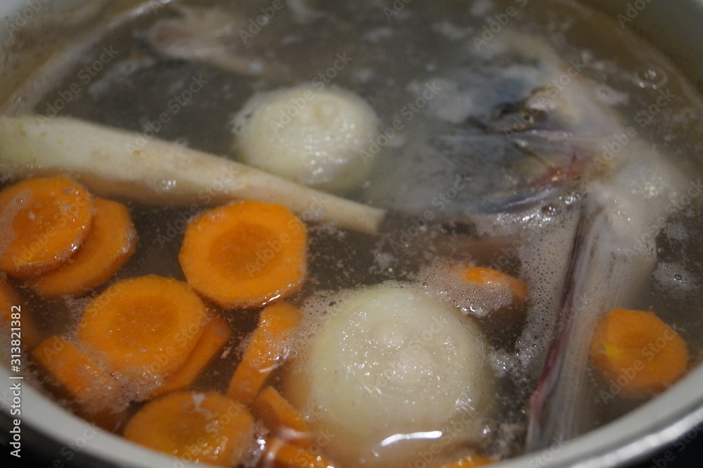 Ταπετσαρία fish soup in the cooking process of the fish cooking in a pot healthy food
