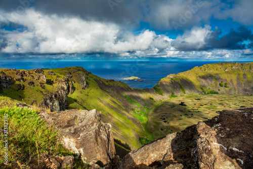 Tangata matu islets in Rapa Nui under Rano Kau photo