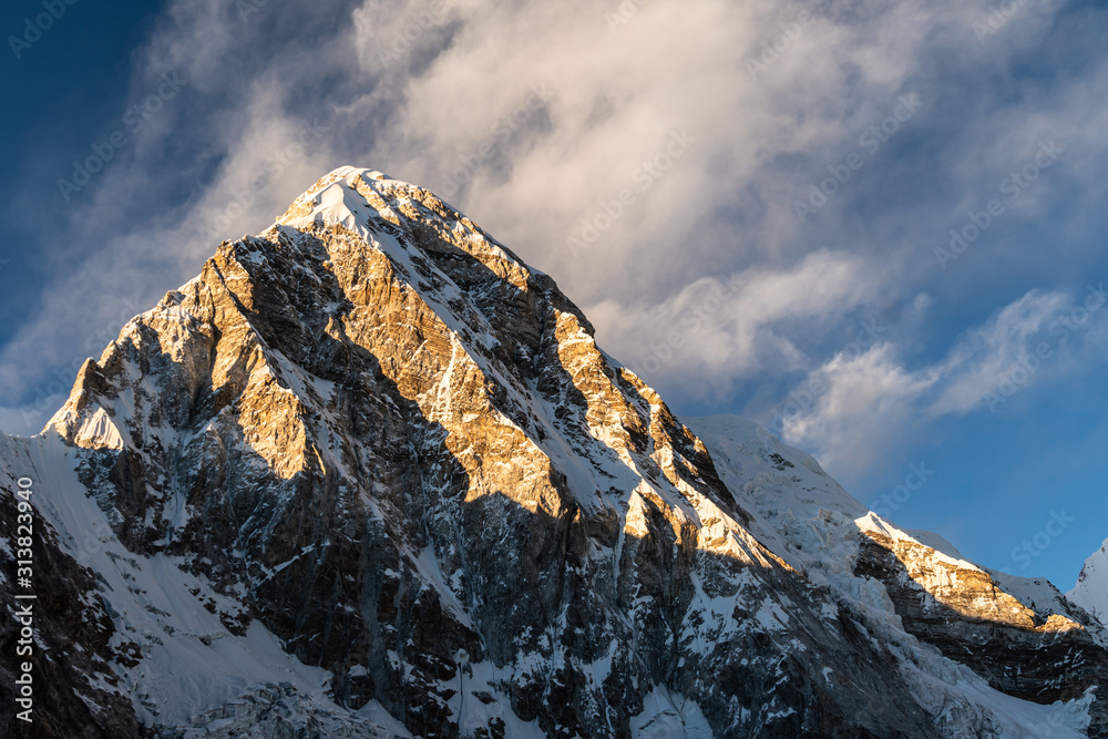 Dramatic view of the Mt Pumori peak from the Kala Patthar viewpoint in the Himalaya in Nepal