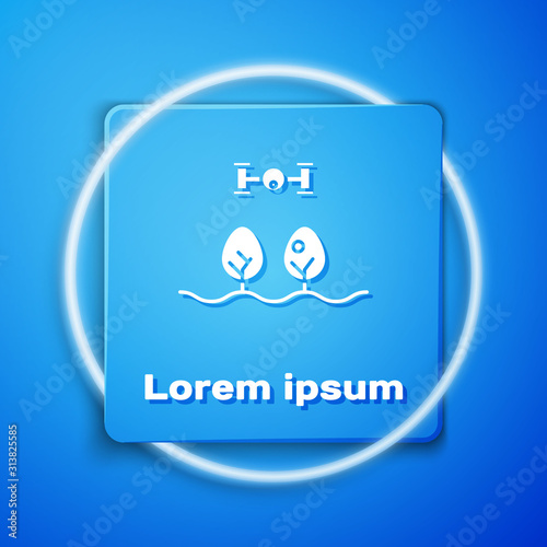 White Smart farm with drone control and tree icon isolated on blue background. Innovation technology for agricultural company. Blue square button. Vector Illustration