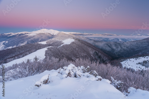 Beautiful pink morning in winter mountains © reme80