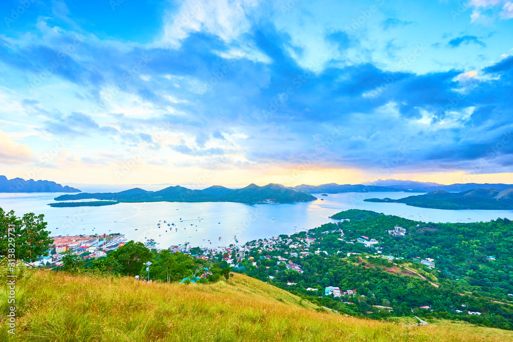 View from Mount Tapyas on Coron Island - North Palawan, Philippines. Looking over Coron Town and Bay at Sunset. View from Mount Tapyas on Coron Island - North Palawan, Philippines. Looking over Coron Town and Bay at Sunset.