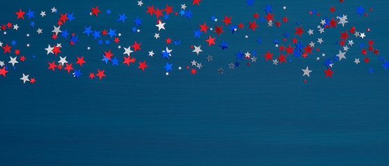 Confetti stars in American flag colors on blue background. Happy Presidents Day Banner mockup. USA Independence Day, Labor Day, Memorial Day, US election concept.