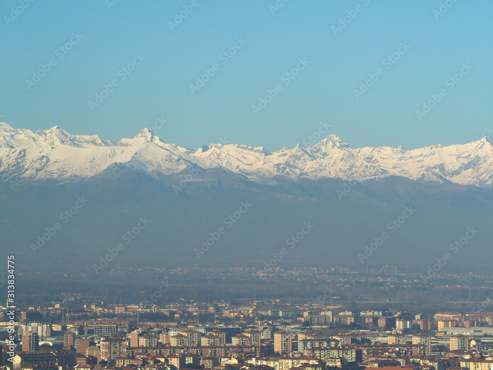 Aerial view of Turin with Alps mountains
