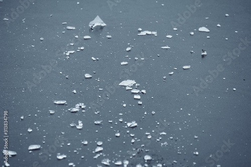 pieces of ice at a frozen city rate in winter photo