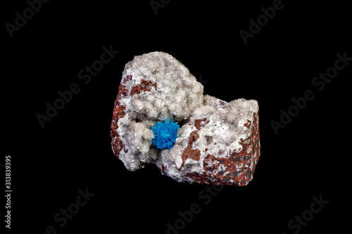 Macro mineral stone Cavansite on a gray background photo