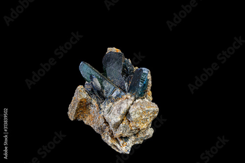 Macro mineral stone Vivianite on a gray background photo