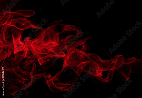 Red smoke abstract on black background, fire design, darkness concept