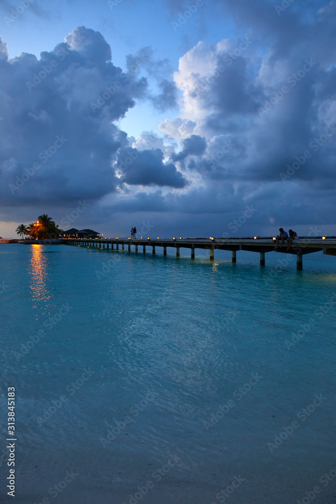 Footbridge of Paradise Island (Lankanfinolhu) at dusk, Maldives Footbridge of Paradise Island (Lankanfinolhu) at dusk, Maldives