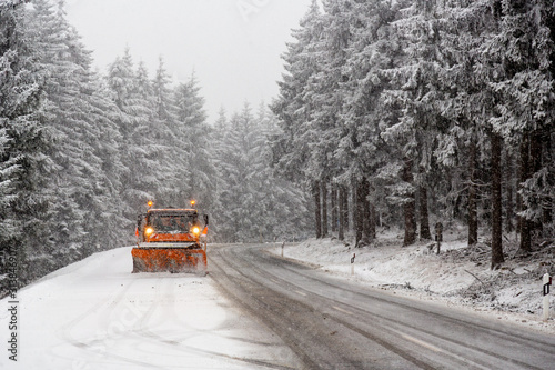 snow plow on forest road
