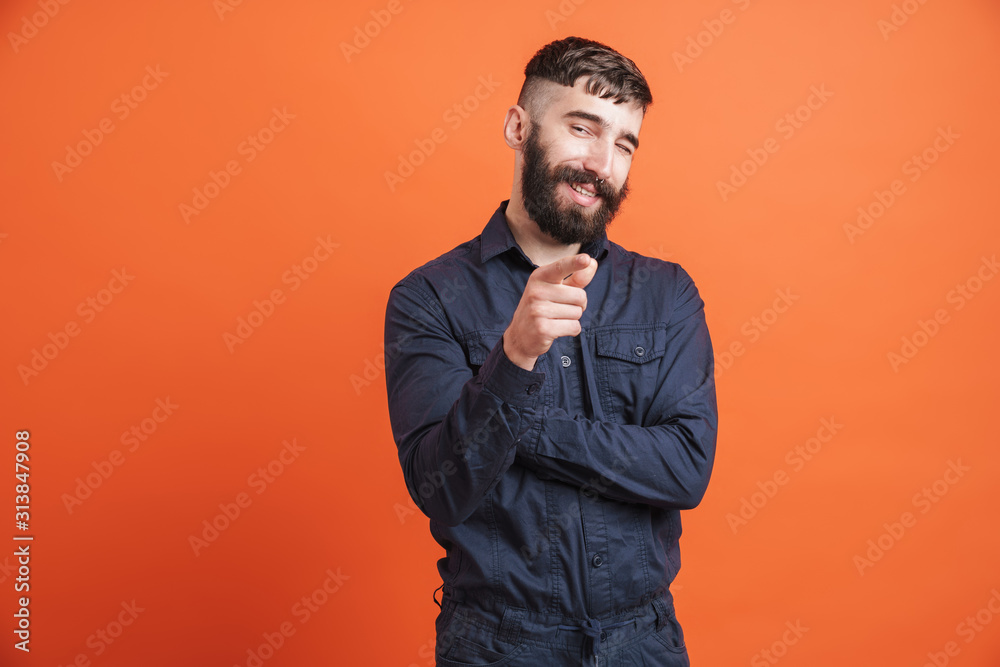 Image closeup of caucasian stylish man pointing finger at camera Image closeup of caucasian stylish man pointing finger at camera