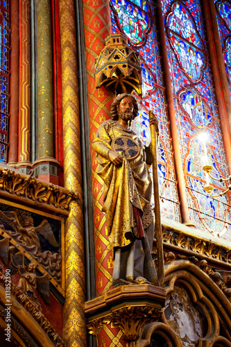 religious statue and stained glass