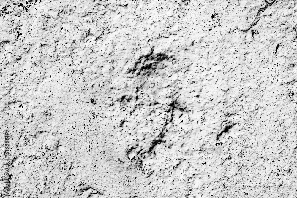 Texture of a concrete wall with cracks and scratches which can be used as a background Texture of a concrete wall with cracks and scratches which can be used as a background