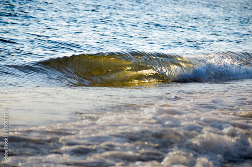 Backlight Micro Waves at Sunset