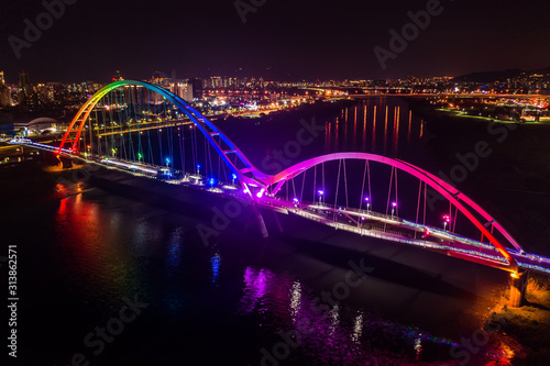 Crescent Bridge - landmark of New Taipei, Taiwan with beautiful illumination at night, photography in New Taipei, Taiwan.