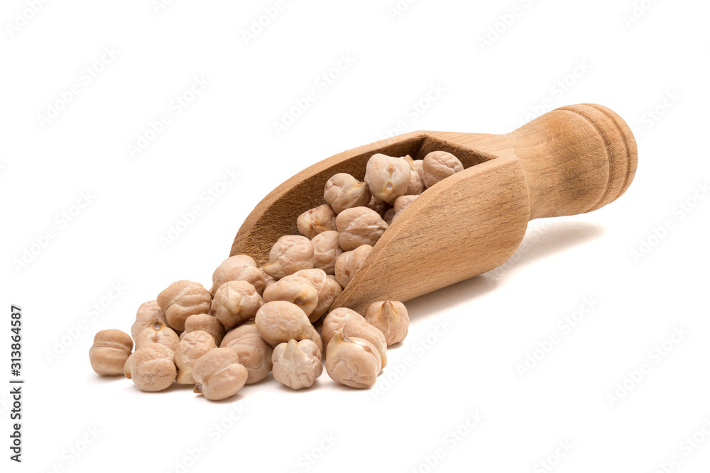 Slanted view of chickpeas on a wooden spoon isolated on white background Slanted view of chickpeas on a wooden spoon isolated on white background