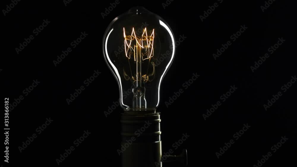 Light bulb Turns On and Off. Close Up.