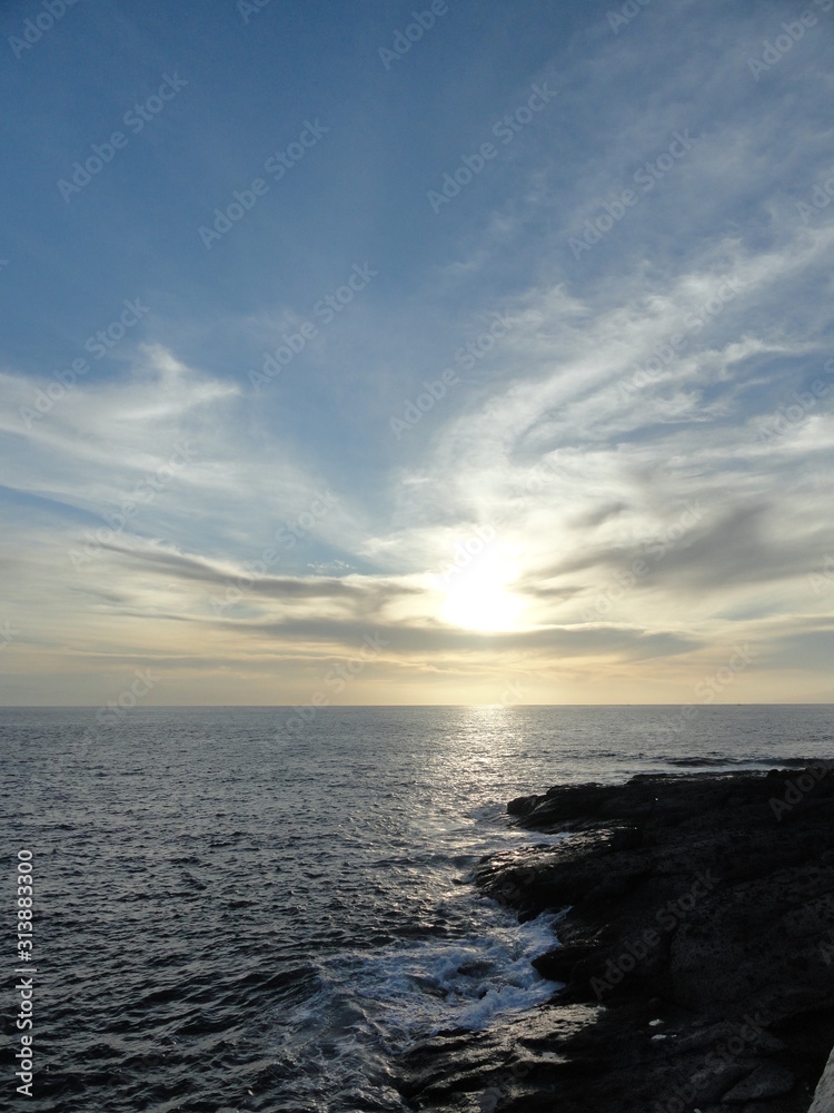 beautiful sunset over the ocean and coast of volcanic rocks, Tenerife beautiful sunset over the ocean and coast of volcanic rocks, Tenerife
