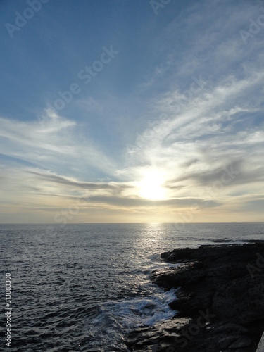 beautiful sunset over the ocean and coast of volcanic rocks, Tenerife