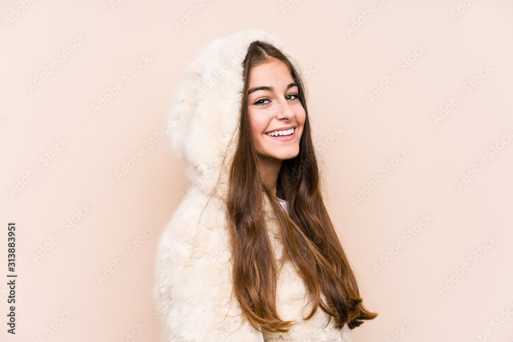 Young caucasian woman posing isolated looks aside smiling, cheerful and pleasant. Young caucasian woman posing isolated looks aside smiling, cheerful and pleasant.