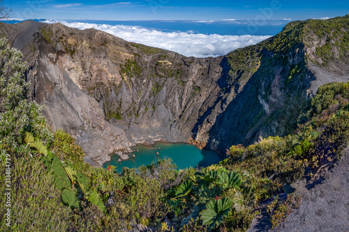 Costa Rica. Irazu Volcano National Park (Spanish: Parque Nacional Volcan Irazu).  View of the volcano and the lake in the crater. photo