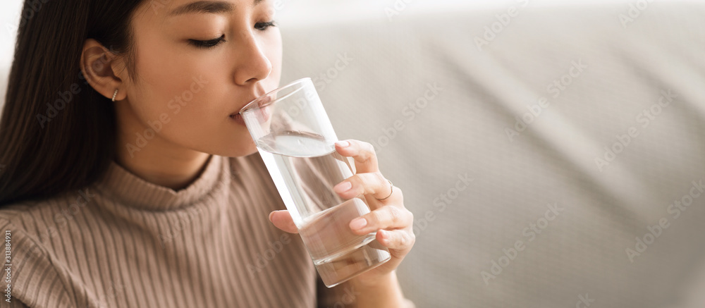 Healthy Liquid. Asian Girl Drinking Clean Water From Glass Healthy Liquid. Asian Girl Drinking Clean Water From Glass