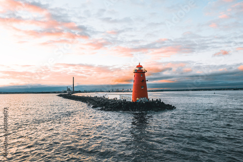 The Poolbeg Lighthouse At A Sunset.