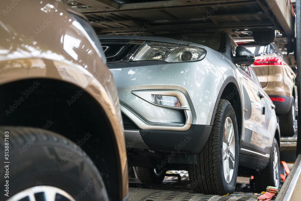 cars on an auto transporter at shallow depth of field