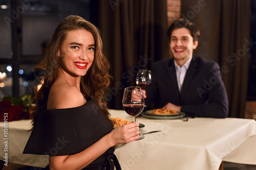 Romantic couple having dating in restaurant.