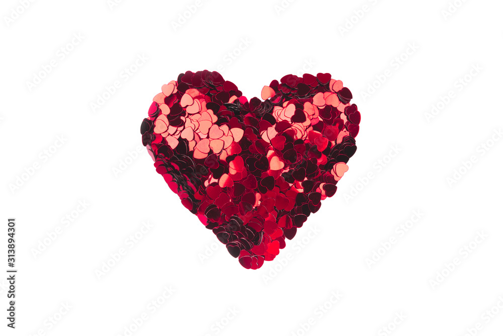 Heart of small red hearts isolated on a white background. Valentine's day concept. Flat lay, top view.