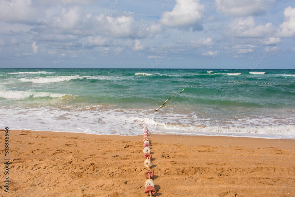A line of buoys on Agva beach on the Black Sea coast in the Sile district of Istanbul province, Turkey.