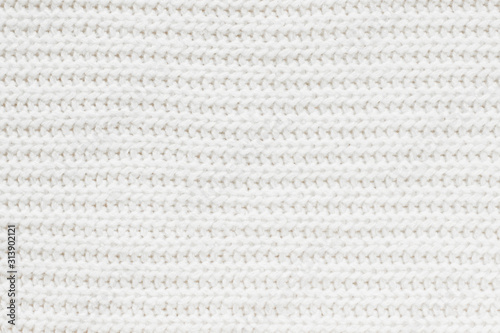 Wool white knitted texture close up