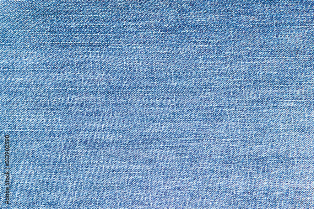 Blue denim background close up Blue denim background close up