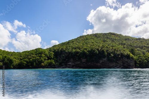 Beautiful View of the Coast on the Caribbean Sea during a vibrant sunny day. Taken in Castries, Saint Lucia. © edb3_16