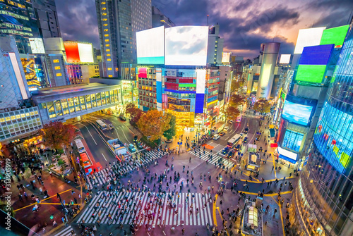 Shibuya Crossing from top view at twilight in Tokyo photo